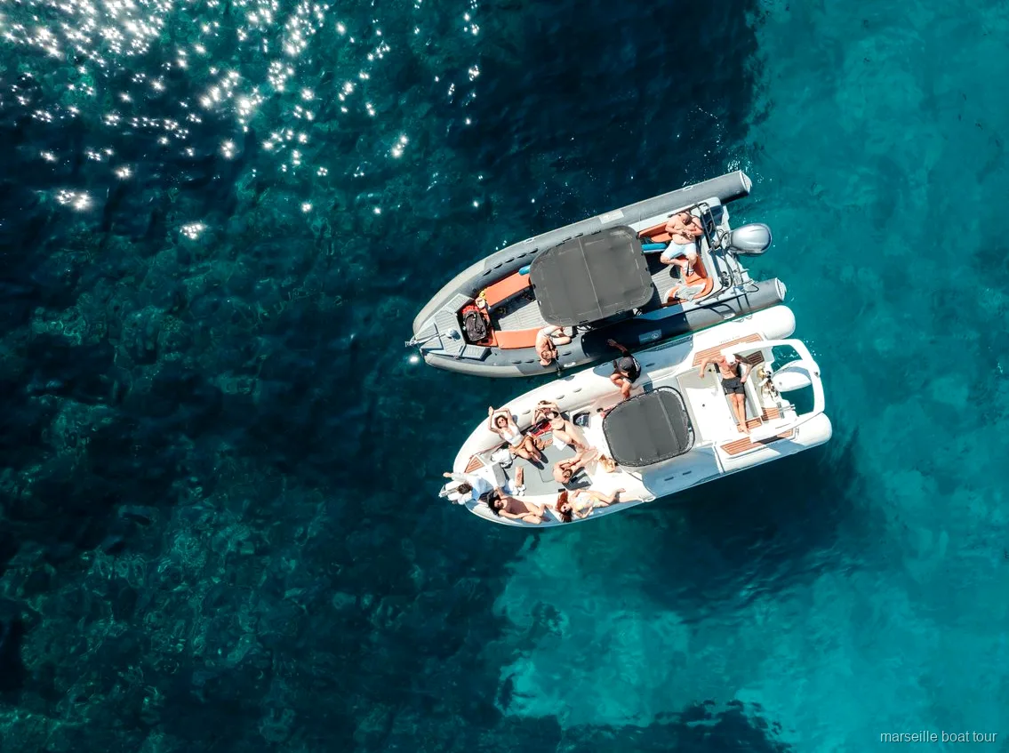 Group enjoying a private boat tour with skipper near Marseille